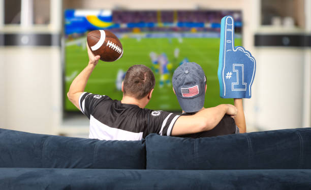 Foam finger and non-alcoholic drinks at a sober Super Bowl watch party