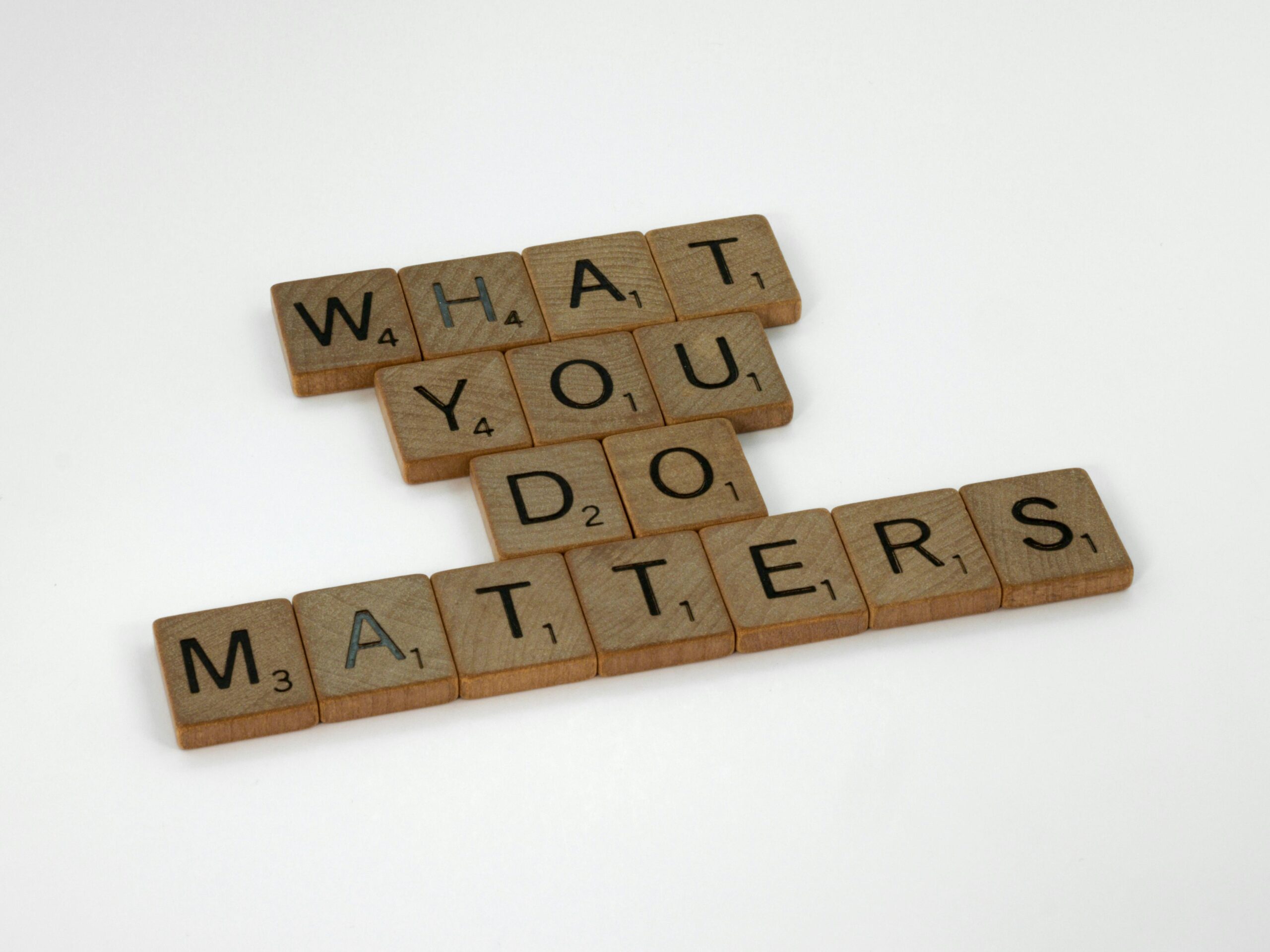 Wooden letter tiles spelling “What you do matters,” representing accountability in recovery